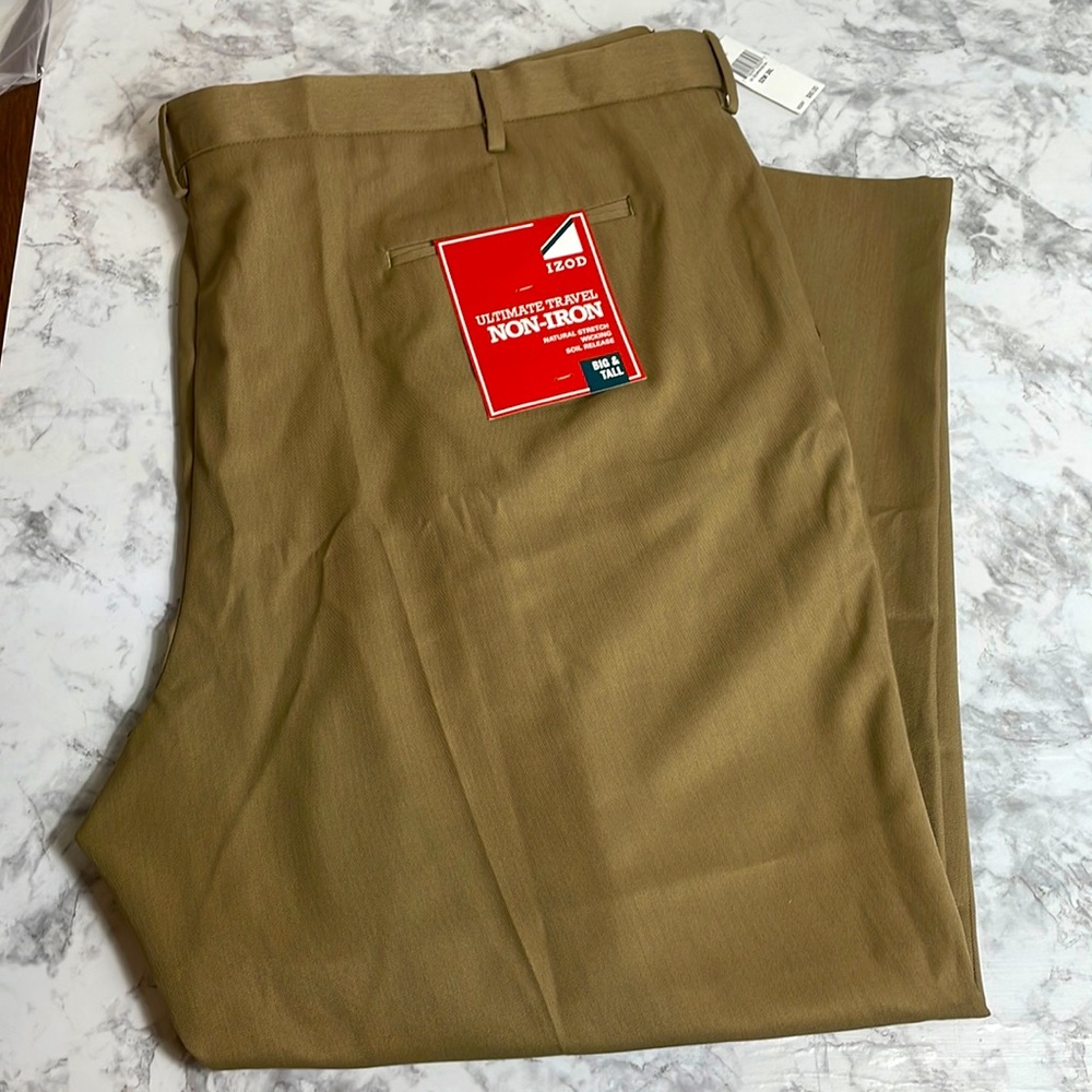 Men’s NWT 52 x 30 Izod tan dress pants. Big and tall double pleated. No iron